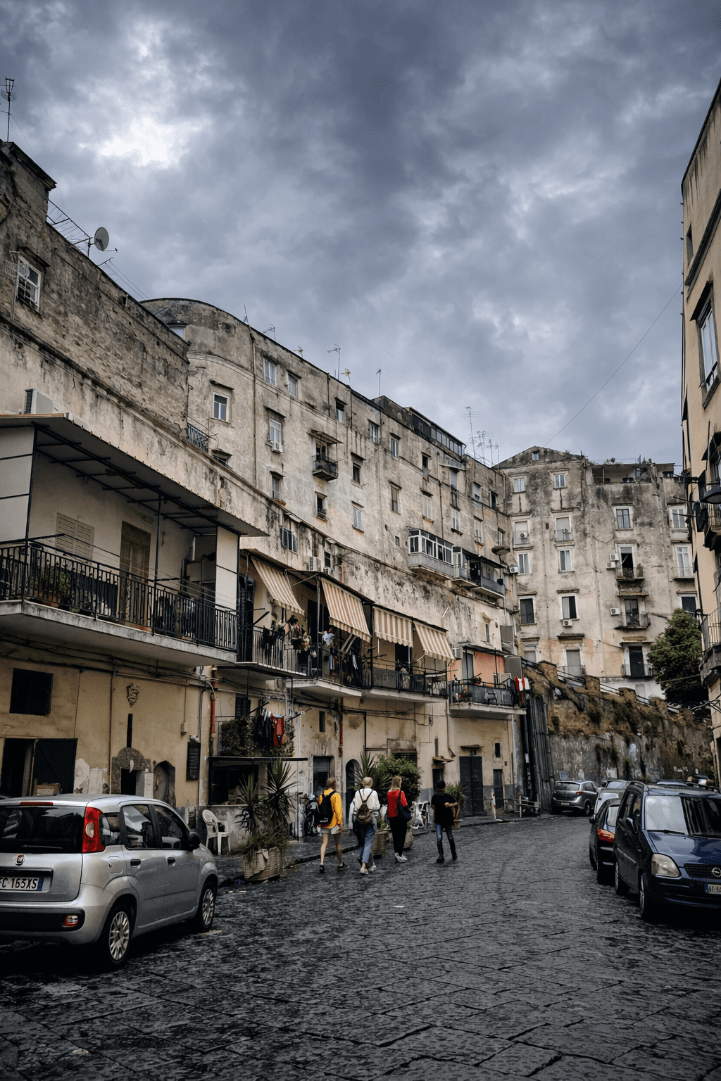 Naples — alleyway under stormy skies